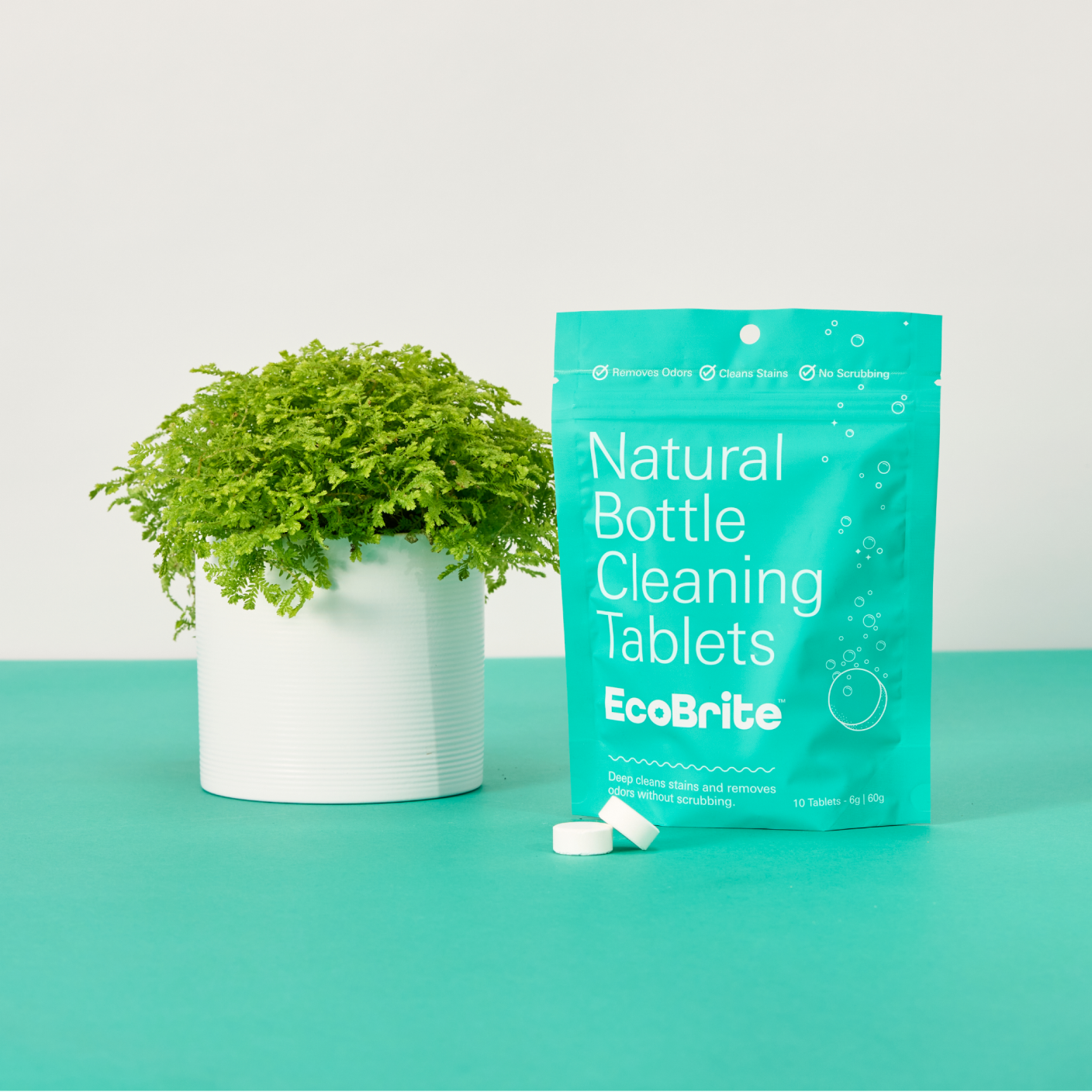 EcoBrite Tables next to foliage